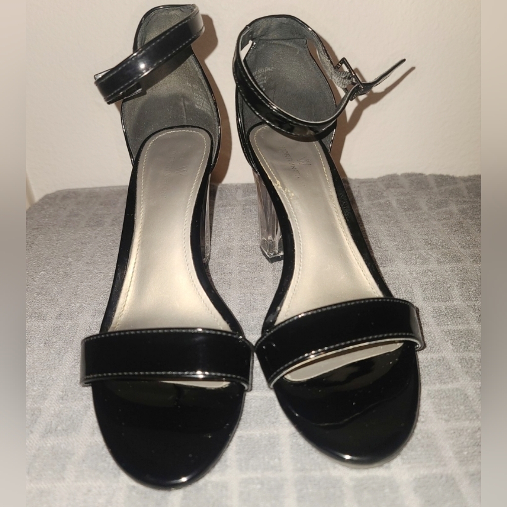 Black vinyl strappy high heel